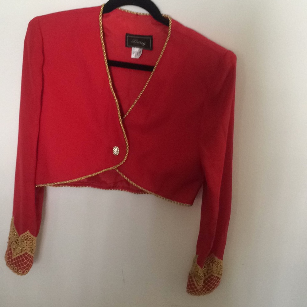 Red jacket with gold ribbon trim